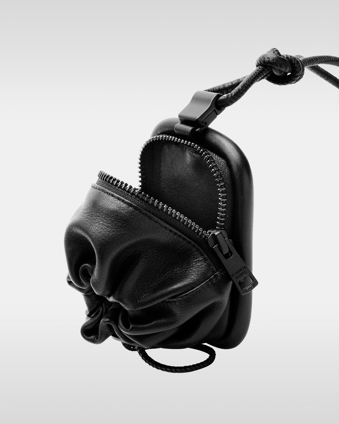 over engineering leather purse